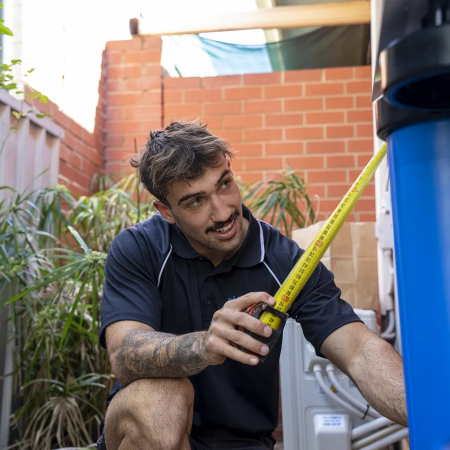 Hall & Baum plumber installing a water filtration system
